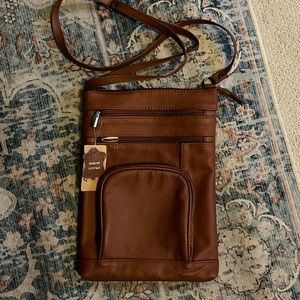 Krediz brown leather purse with original tags! This is a beautiful purse!